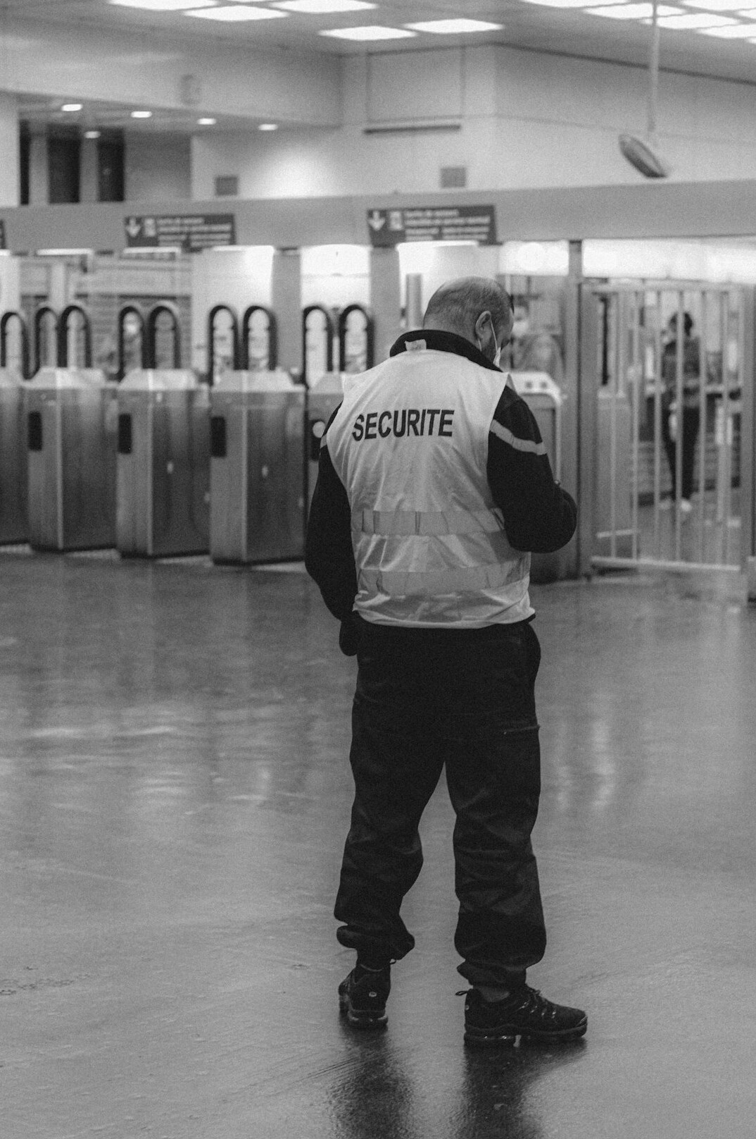 store detective watching camera