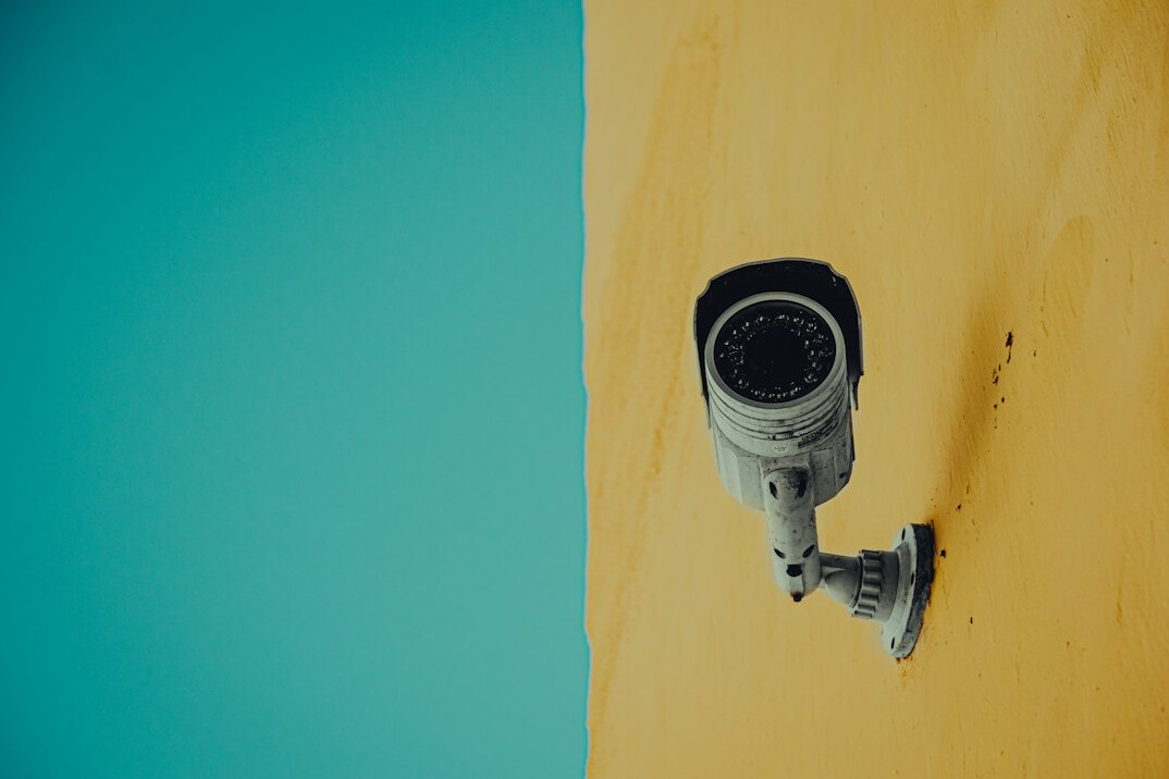 security guard monitoring cameras